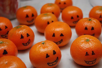 Decoración Halloween, calabazas y mandarinas